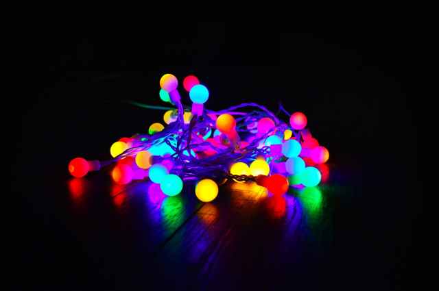 assorted color string lights on dark room