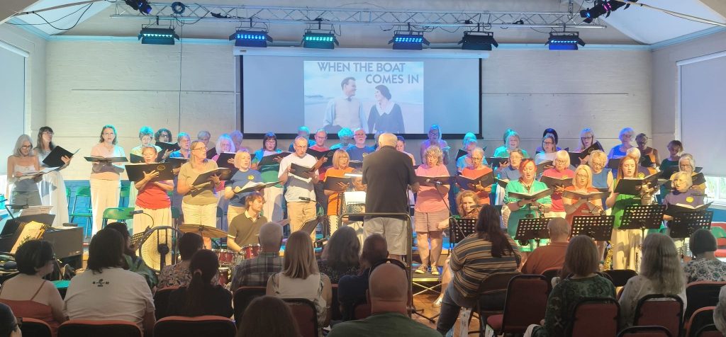 Choir singing with audience watching